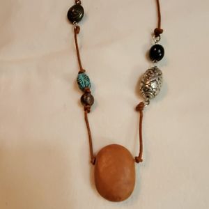 Interesting multi medium necklace